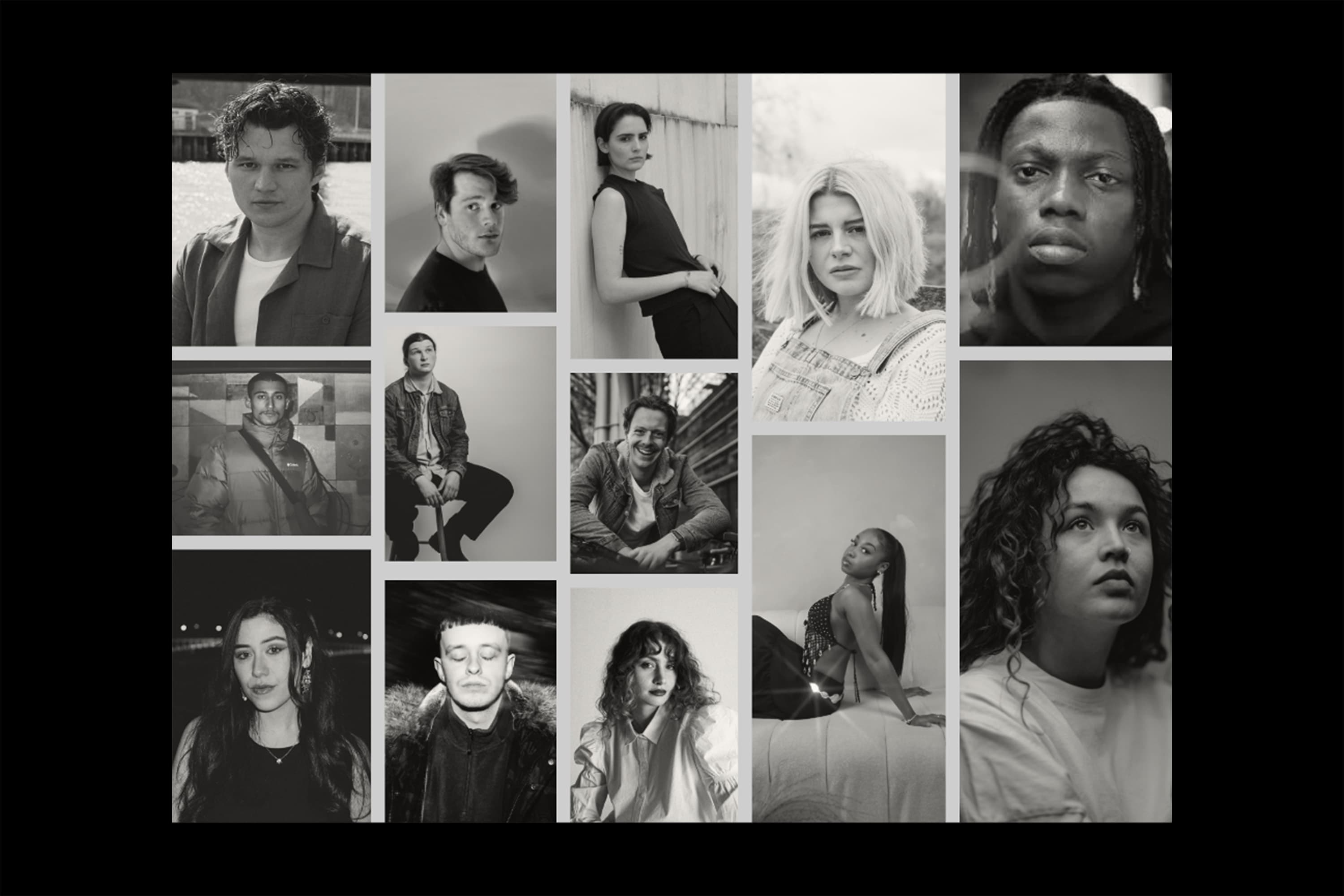 A cover image of NIKI sat against a brick wall looking off towards the side.